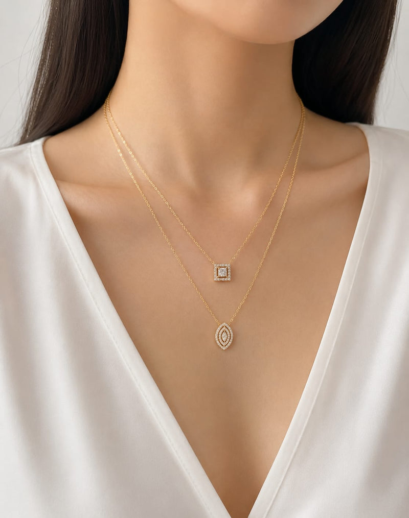 Minimal everyday personalised jewellery collection by Mivraa featuring elegant gold necklaces